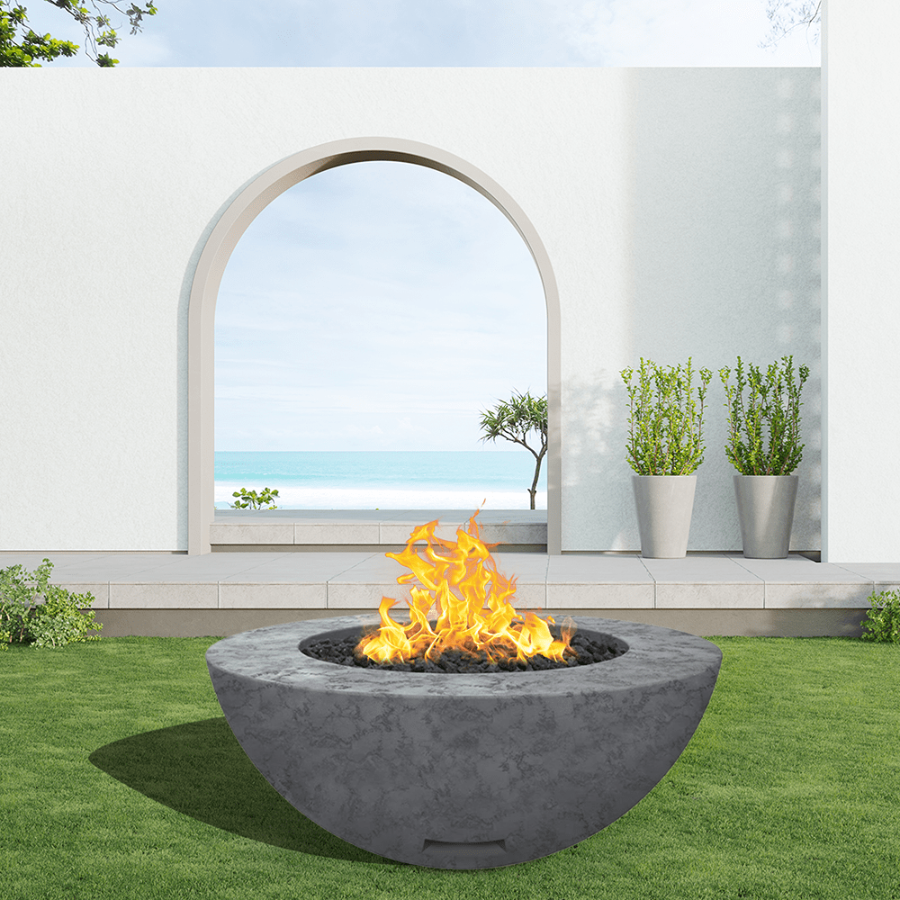 modern blaze round coal fire bowl with textured surface in a light outdoor setting