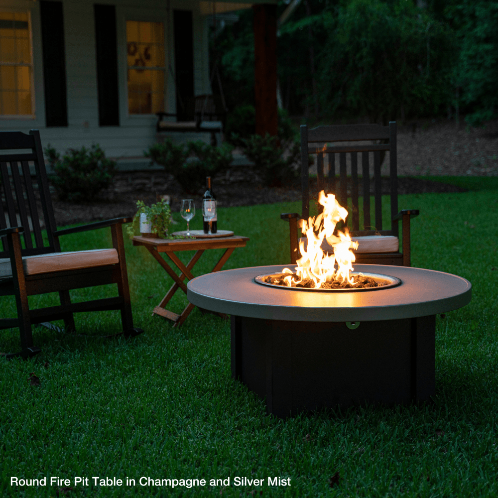 Modern Blaze 42-Inch Round Fire Pit Table in backyard