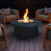 Modern Blaze 42-Inch Round Fire Pit Table on composite deck