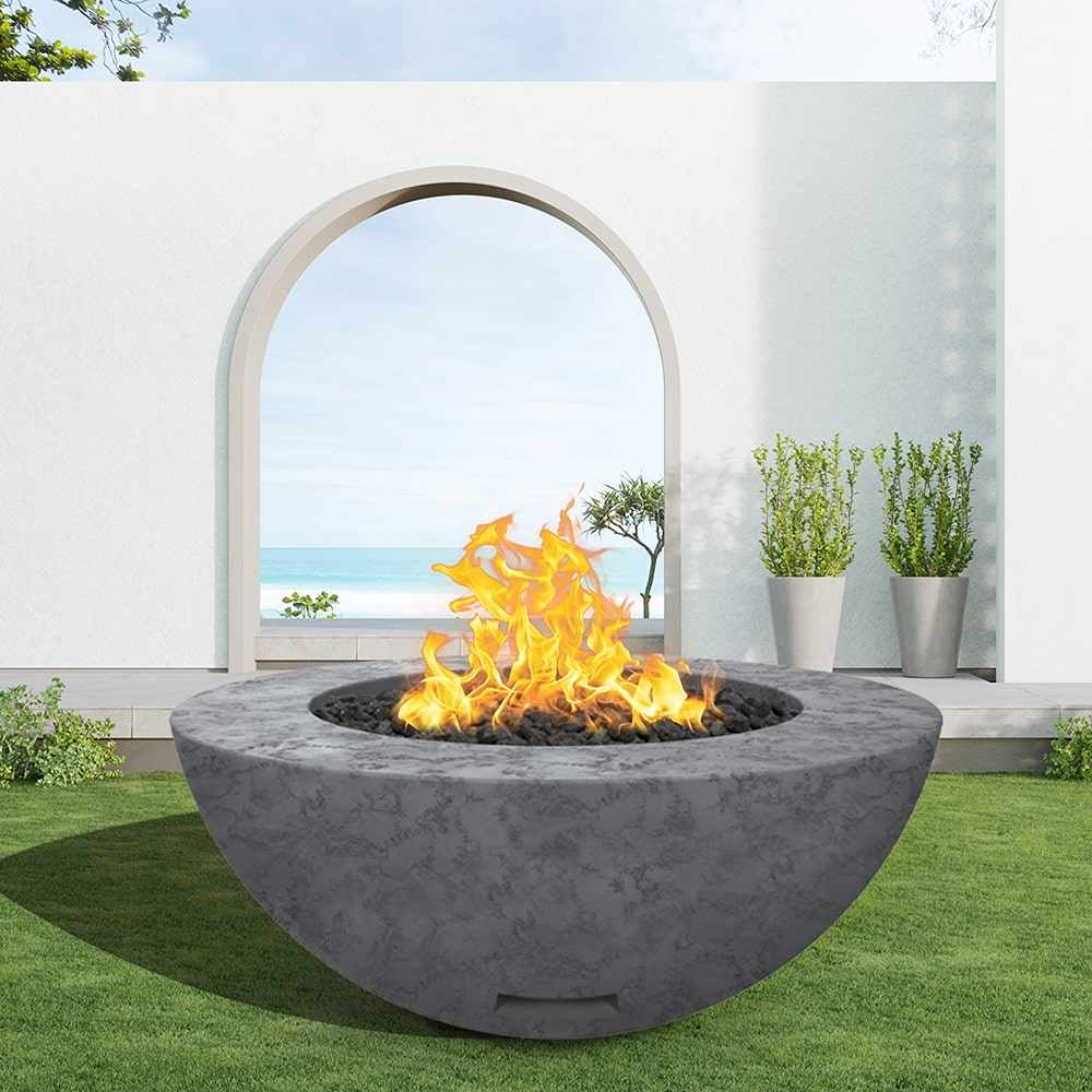 modern blaze round coal fire bowl with textured surface in a light outdoor setting
