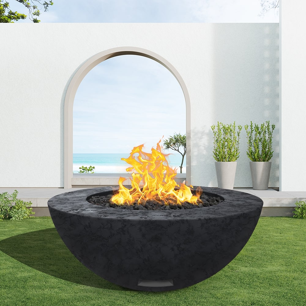 modern blaze round raven fire bowl with textured surface in a light outdoor setting