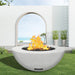 modern blaze round arctic fire bowl with smooth surface in a light outdoor setting