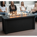 Modern Blaze 54-Inch Linear Fire Pit Table in cozy seating area