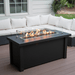 Modern Blaze 54-Inch Linear Fire Pit Table in cozy patio setting