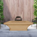 Modern Blaze Mt. Shasta Stone Age Dining Height Fire Pit Table in a lush patio setting