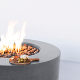 Smooth edges of the modern blaze cascade cliffs oblica round fire pit
