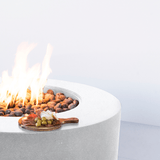 Smooth edges of the modern blaze shasta snow oblica round fire pit