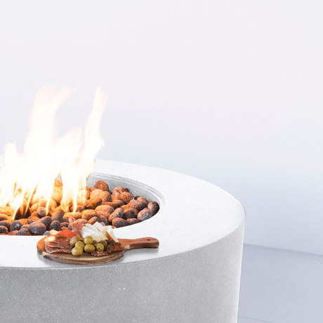Smooth edges of the modern blaze shasta snow oblica round fire pit