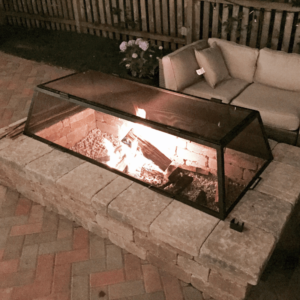 Modern Blaze Rectangular Mesh Screen on Fire Pit at night