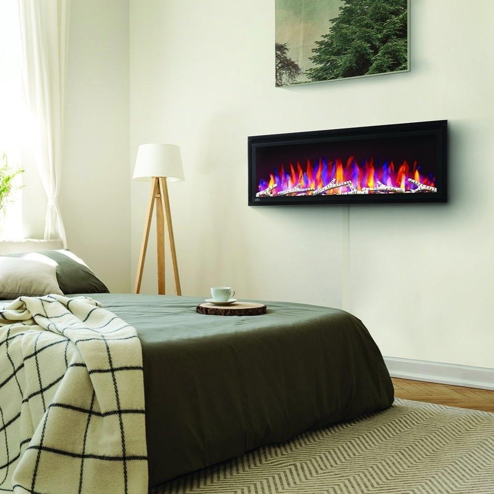 Napoleon Entice™ Built-in / Wall Mounted Electric Fireplace In A Bedroom