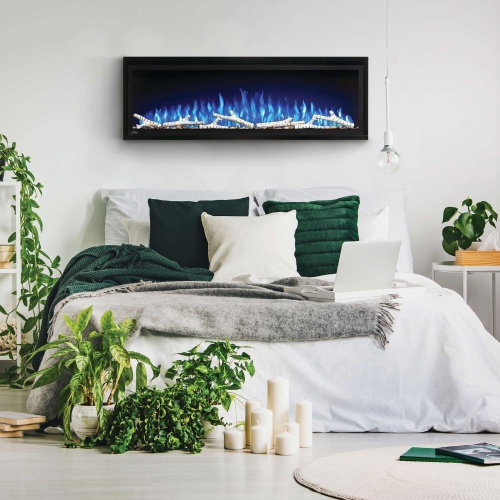 Napoleon Entice™ Built-in / Wall Mounted Electric Fireplace In A Bedroom