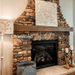 olde wood rough sawn wooden fireplace mantel in living room