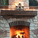 olde wood rough sawn wooden fireplace mantel with teak finish outdoors