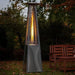 RADtec Tower Flame 89-Inch Tall Stainless Steel Propane Patio Heater in a garden