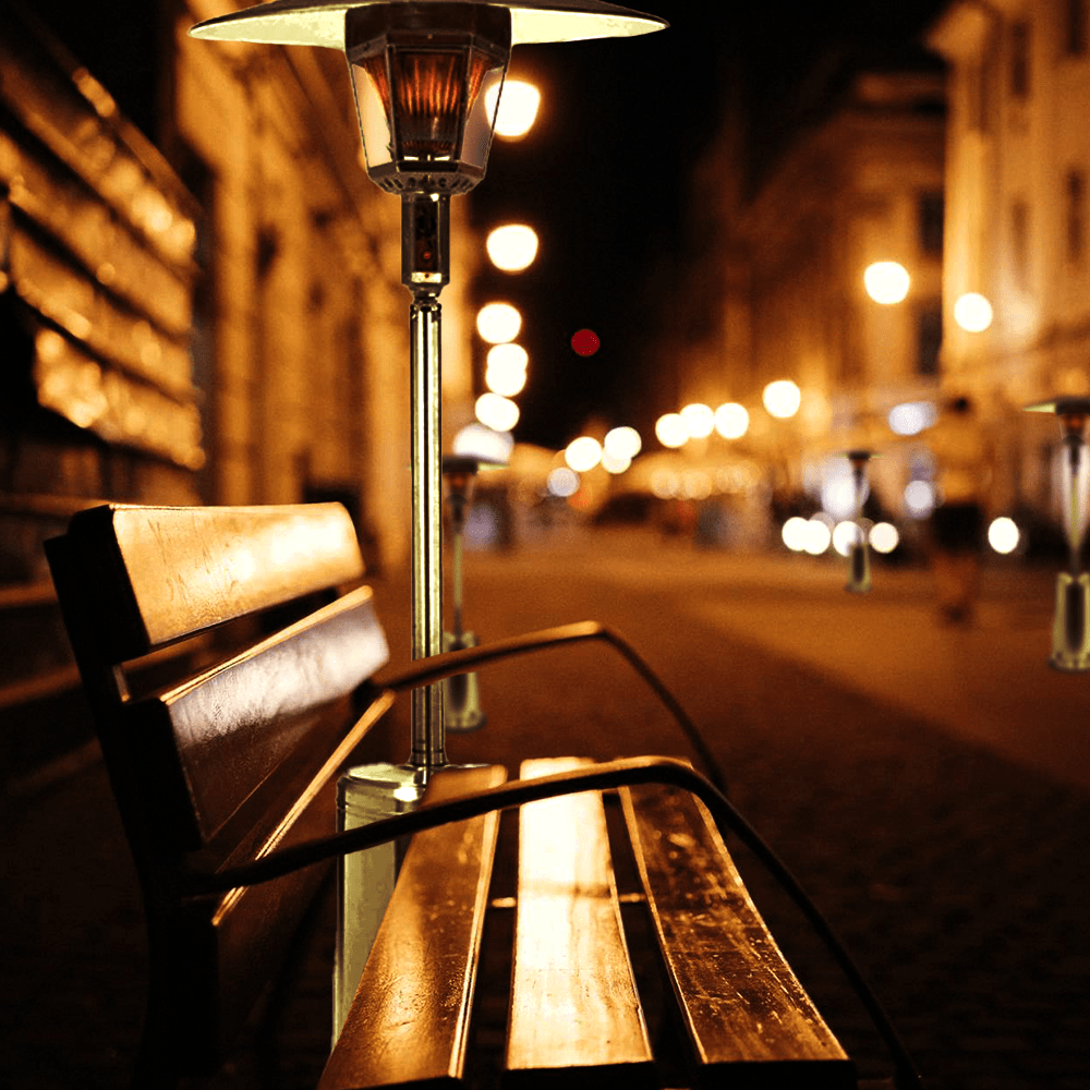 RADtec Real Flame Stainless Steel Patio Heater beside outdoor bench