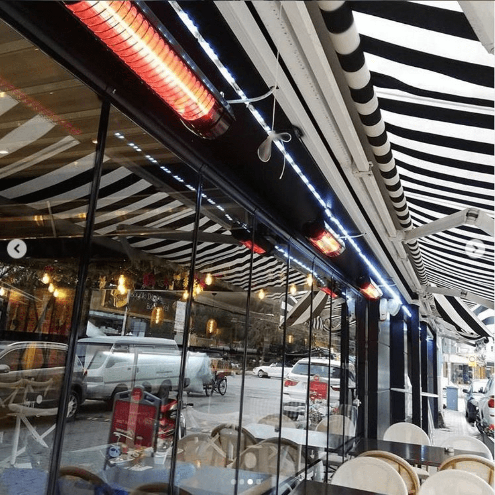 radtec torrid heaters ceiling mounted in outdoor dining area