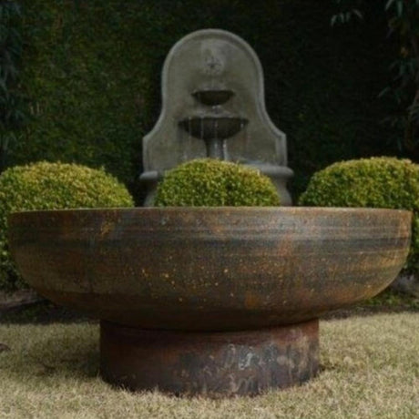 Seasons Fire Pits Elliptical Round Steel Fire Pit in Outdoor Area