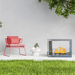 The Bio Flame Sek XL White 53-Inch Free Standing Ethanol Fireplace in a garden