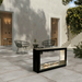 The Bio Flame Sek XL 53-Inch Free Standing Ethanol Fireplace in an outdoor space