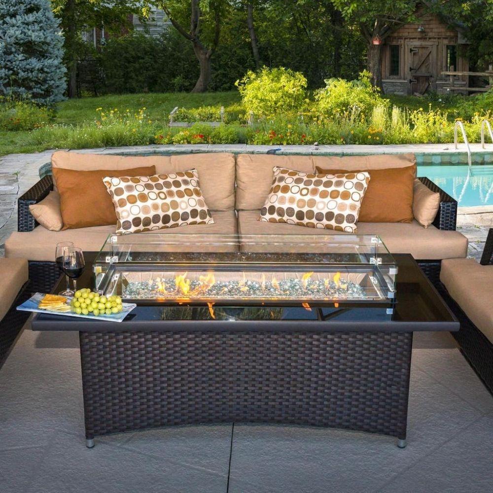 The Outdoor GreatRoom Company Balsam Montego 59" Gas Fire Pit Table by the pool 