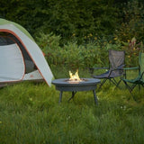 Renegade 32-Inch Round Portable Gas Fire Pit Table (RNG-32) outside tent