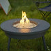 Renegade 32-inch Round Portable Gas Fire Pit Table placed outdoors
