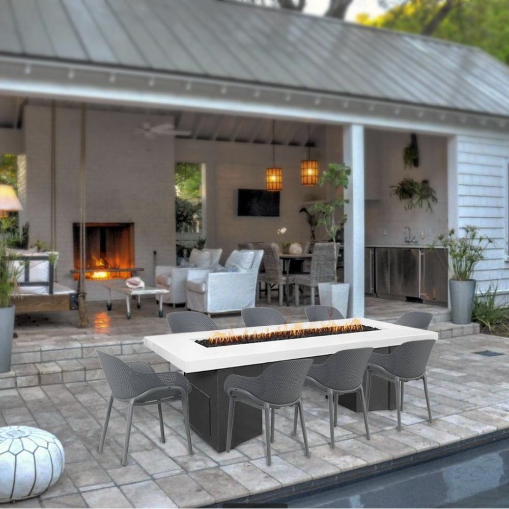 Black and White Dining Fire Table with Gray Chairs in Outdoor Patio