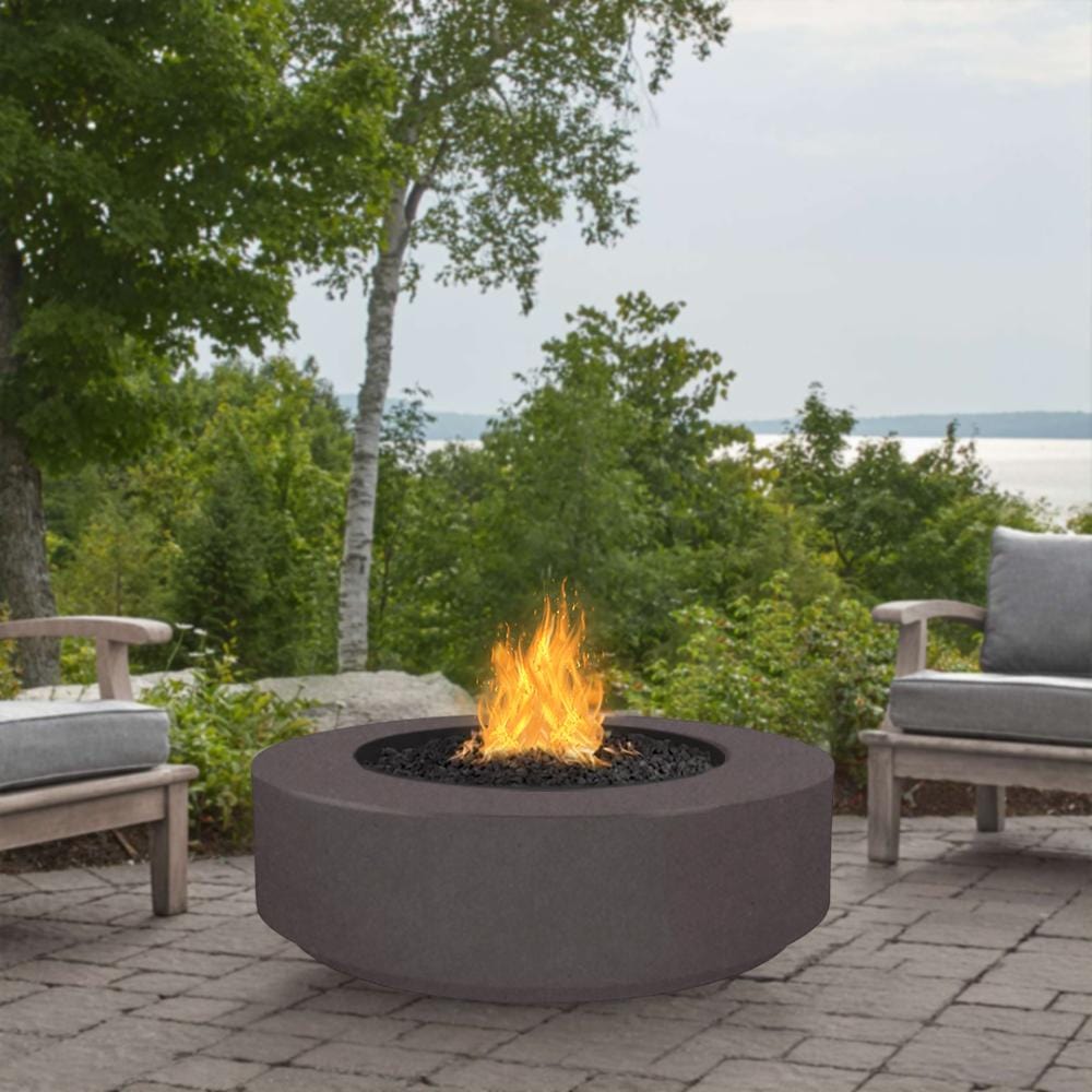 Chestnut Round Fire Pit in Patio with Chairs and Trees