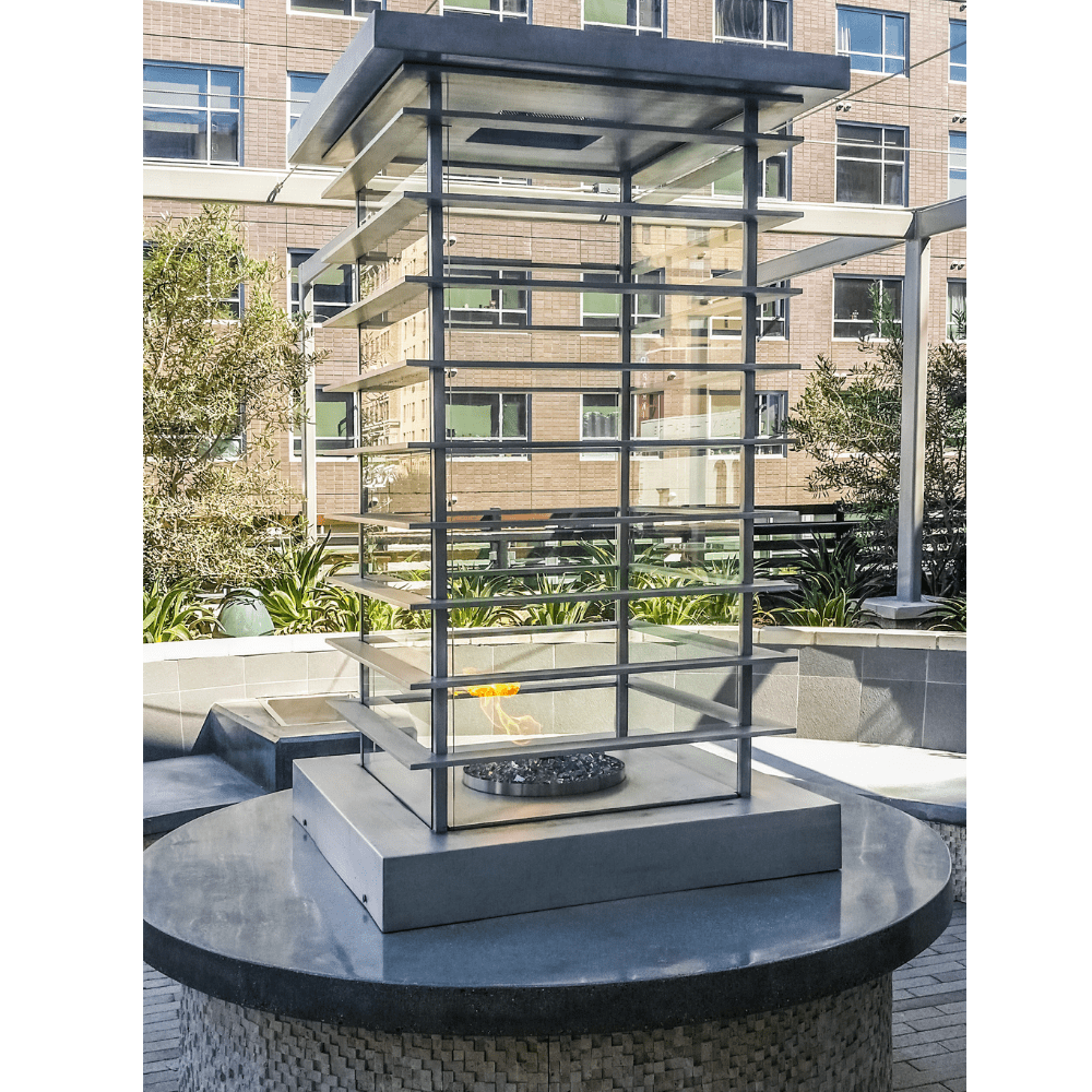 Top Fires High-Rise 72" Tall Stainless Steel Gas Fire Tower Placed Outdoors