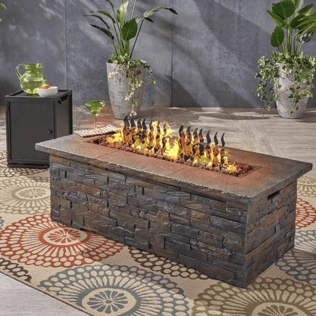 Top Fires Steel Wave Ornamental Linear Gas Burner on stone fire pit