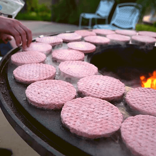 Grilling Patties on the Top Fires the Mojave Cast-Iron Grill