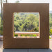 corten steel square outdoor gas fireplace with scenic view