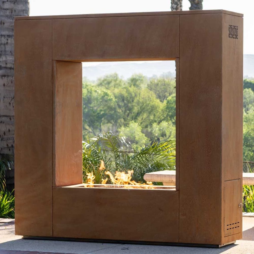 corten steel square outdoor gas fireplace in backyard