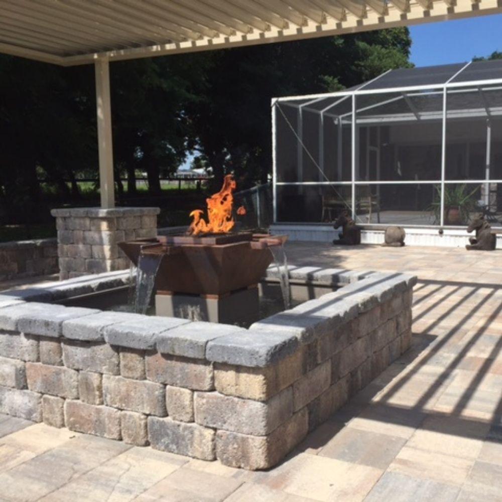 top fires olympian 4-way fire and water fountain in outdoor area