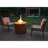 Top Fires Round Corten Steel Fire Pit in outdoor patio