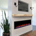 Touchstone Sideline Elite Electric Fireplace with Wood Mantel below the tv