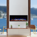 touchstone sideline elite outdoor fireplace with multicolor flames in beautiful outdoor setting