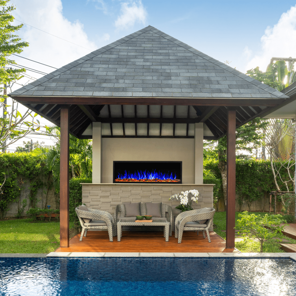 touchstone sideline elite outdoor electric fireplace in modern pergola with blue flames