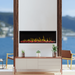 touchstone sideline elite outdoor fireplace with yellow flames in beautiful outdoor setting
