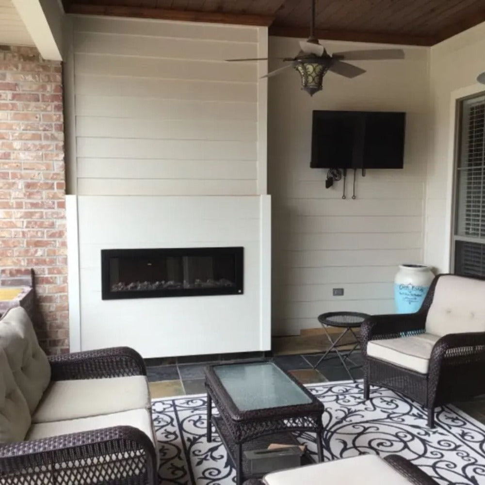 Touchstone Sideline Outdoor 50-Inch Recessed / Wall Mounted Electric Fireplace, No Heat (#80017) in Patio setting