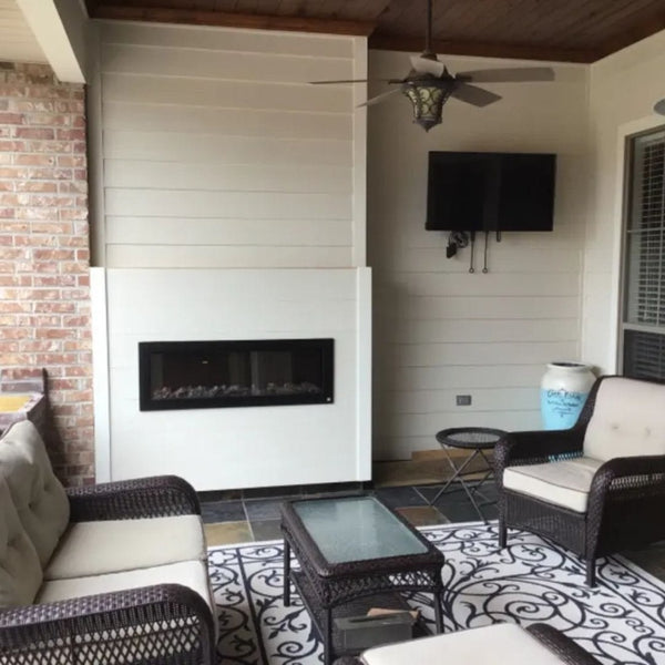 Touchstone Sideline Outdoor 50-Inch Recessed / Wall Mounted Electric Fireplace, No Heat (#80017) in Patio setting