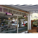 Victory HLWA Series 19" Gold Lamp Wall-Mounted in Outdoor Dining Area